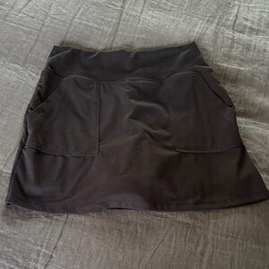 Athletic Skort with built in shorts and front pockets. Only worn 3-4 times.